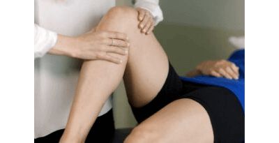 Physiotherapist assessing the knee