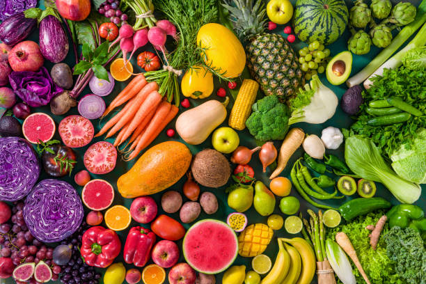 Colorful raw fruits and vegetables varied vegan food