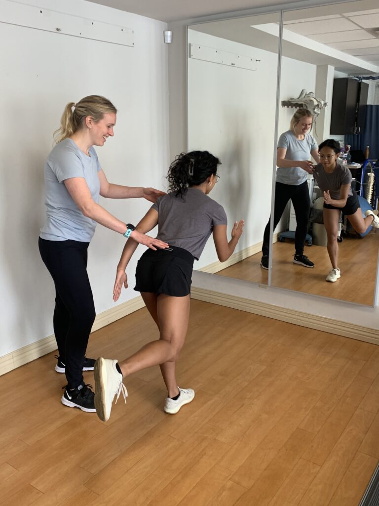 Lauren Kanko, Physiotherapist teaching running techniques to patient