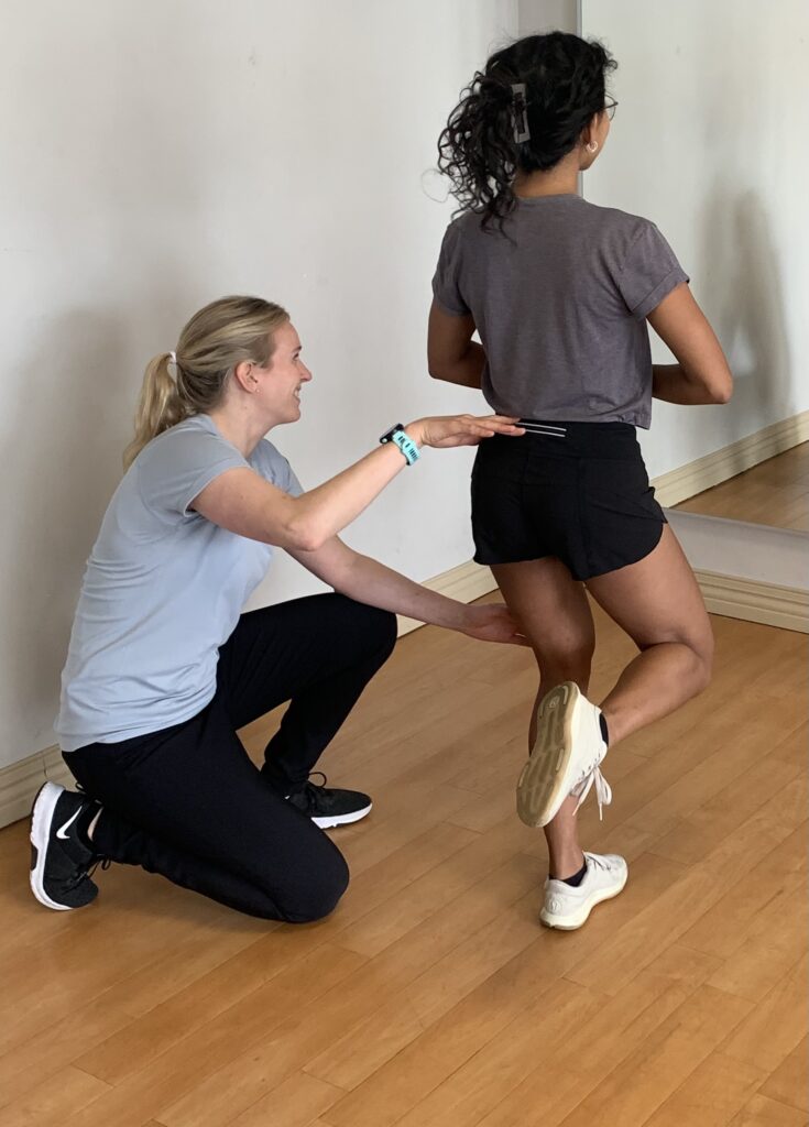 Lauren Kanko, Physiotherapist teaching running techniques to patient