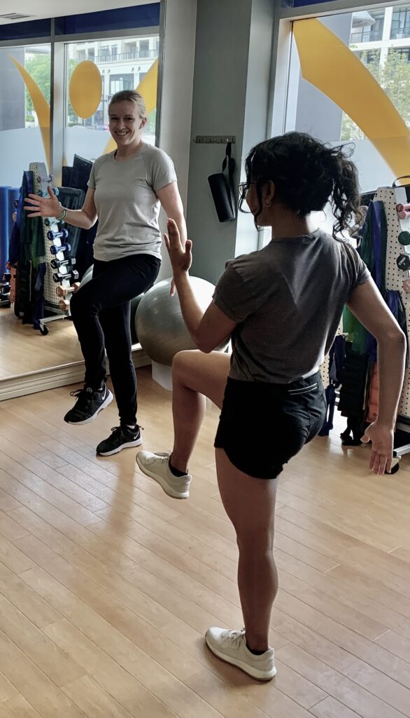 Lauren Kanko, Physiotherapist teaching running techniques to patient